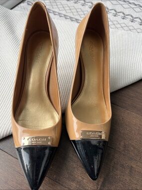 Coach Two-Tone Tan and Black Patent Pointed Toe Pumps